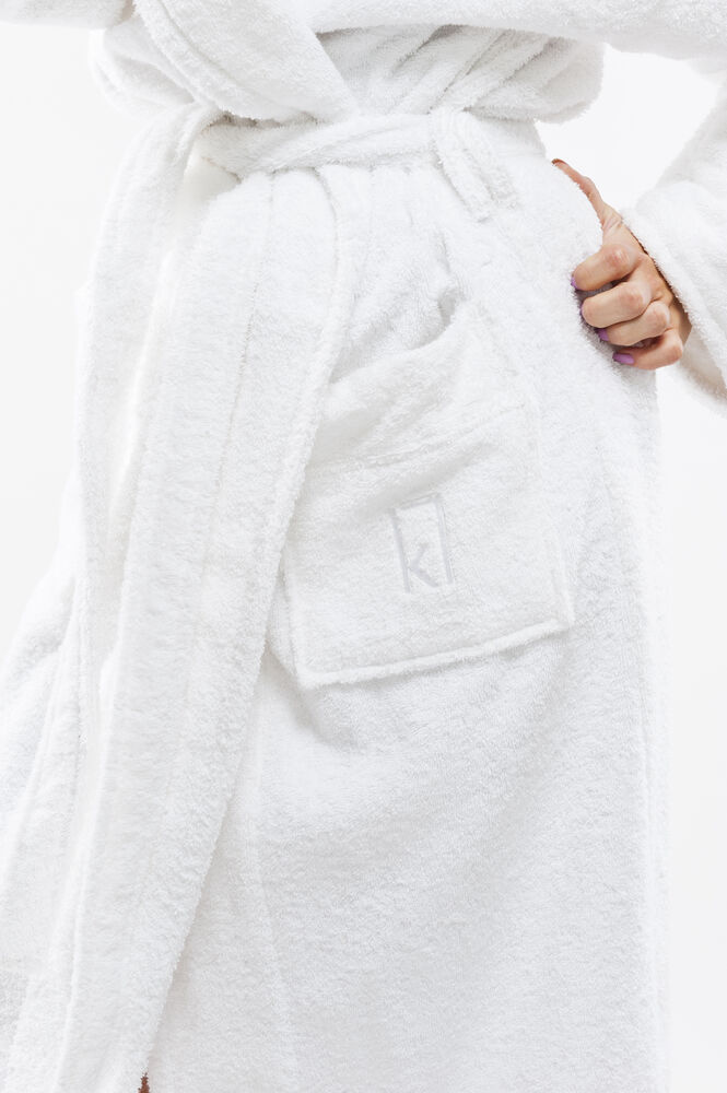 Närbild på badrockens midja och ficka