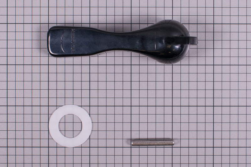 Handtagets komponenter mot en rutad bakgrund