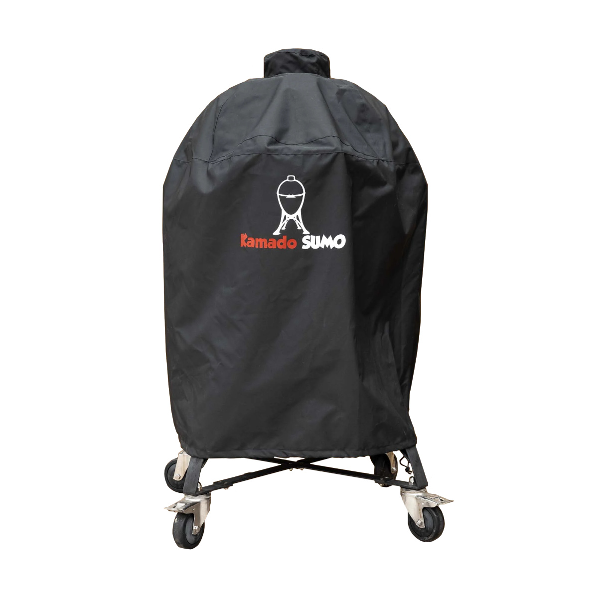 En Kamado Sumo Classic med överdrag på sig 