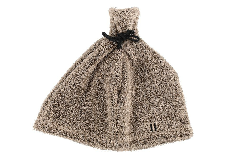 Bastumössan mot en vit bakgrund