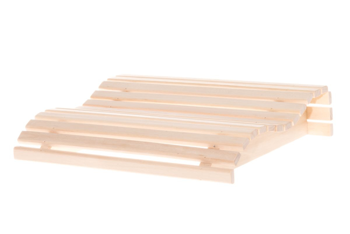 Bastukudden i asp sedd snett framifrån mot en vit bakgrund