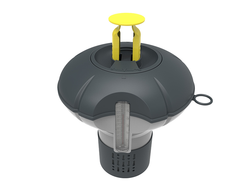 Doseringsflottören med tablettinsatsen uppdragen